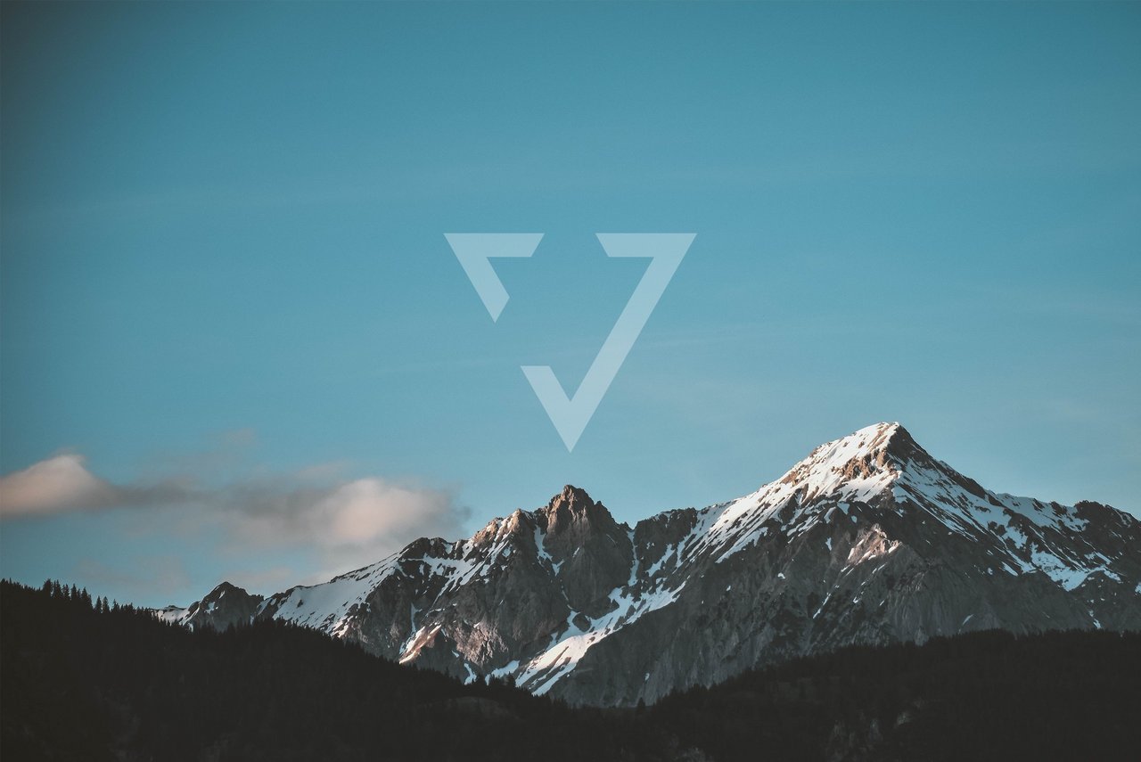 Panorama of a mountain view with web-vision logo